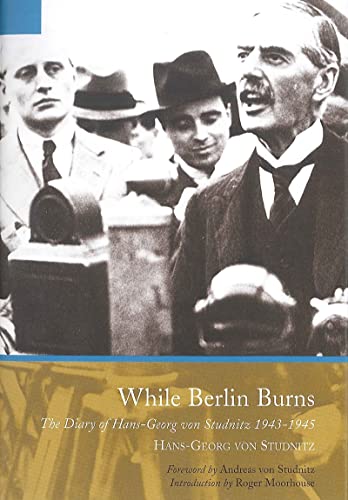 While Berlin Burns: The Memoirs of Hans-Georg von Studnitz [Paperback]