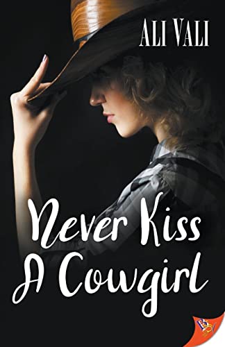 Never Kiss a Cowgirl [Paperback]