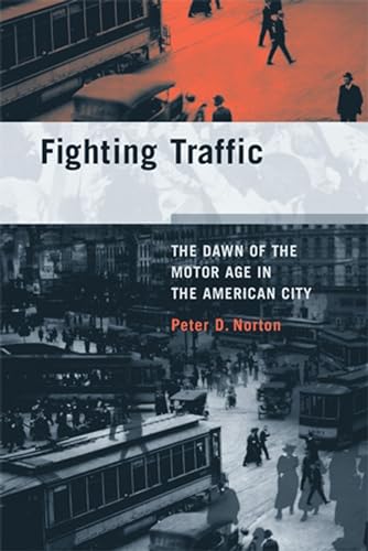 Fighting Traffic: The Dawn of the Motor Age in the American City [Paperback]